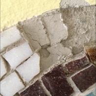 Deteriorated adhesive before the removal.